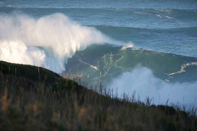 Nov 29, 2014 - Nazare, Portugal - SEBASTIAN STEUDTNER of Germany surfing a huge wave during a swell for the 2015 XXL Big Wave Ride of The Year Award entry in the Atlantic Ocean at Praia do Norte, Nazare. Surfing 2014 - XXL Big Wave Swell Nazare - ZUMAt126