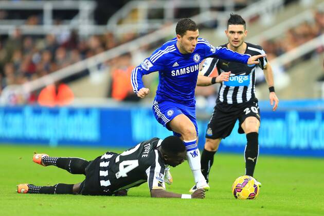 Cheik Tiote of Newcastle United falls as he tracks Eden Hazard of Chelsea - Newcastle United vs. Chelsea - Barclay s Premier League - St James Park - Newcastle- 06 12 2014 Pic Philip Oldham Sportimage EDITORIAL USE ONLY. No use with unauthorised audio, video, data, fixture lists, club league logos or live services. Online in-match use limited to 120 images, no video emulation. No use in betting, games or single club league player publications.