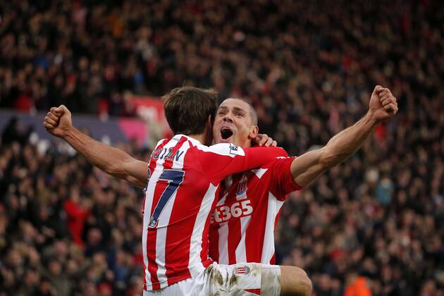 Aktuell Fußball, England, Premier League, Stoke City - FC Arsenal Bojan celebrates scoring the second goal for Stoke City with Jonothan Walters - Football - Stoke City vs Arsenal - Barclays Premiership - Britannia Stadium Stoke - Season 14 15 - 6th December 2014 Photo Malcolm Couzens Sportimage EDITORIAL USE ONLY. No use with unauthorised audio, video, data, fixture lists, club league logos or live services. Online in-match use limited to 120 images, no video emulation. No use in betting, games or single club league player publications.
