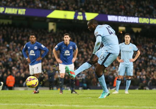 Yaya Toure of Manchester City scores the first goal from the penalty spot - Barclays Premier League - Manchester City vs Everton - Etihad Stadium - Manchester - England - 6th December 2014 - Picture Simon Bellis Sportimage EDITORIAL USE ONLY. No use with unauthorised audio, video, data, fixture lists, club league logos or live services. Online in-match use limited to 120 images, no video emulation. No use in betting, games or single club league player publications.