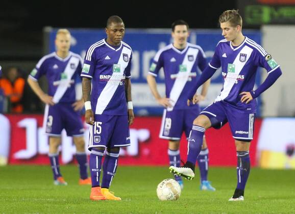 - MOUSCRON, BELGIUM: Anderlecht s Cyriac Gohi Bi Zoro and Anderlecht s Dennis Praet look dejected during the Jupiler Pro League match between Royal Mouscron-Peruwelz and RSC Anderlecht, in Mouscron, Saturday 06 December 2014, on day 18 of the Belgian soccer championship. VIRGINIExLEFOUR  x04515904x