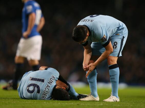 Sergio - Kun - Agüero of Manchester City distraught after picking up an injury - Barclays Premier League - Manchester City vs FC Everton - Etihad Stadium - Manchester - England - 6th December 2014 - EDITORIAL USE ONLY. No use with unauthorised audio, video, data, fixture lists, club league logos or live services. Online in-match use limited to 120 images, no video emulation. No use in betting, games or single club league player publications.