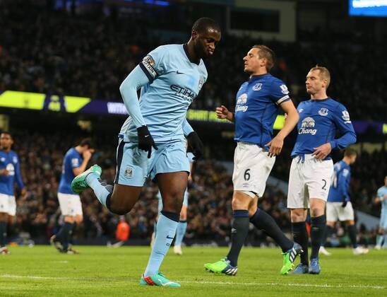 Yaya Toure of Manchester City celebrates scoring the only goal from a penalty - Barclays Premier League - Manchester City vs FC Everton - Etihad Stadium - Manchester - England - 6th December 2014 - EDITORIAL USE ONLY. No use with unauthorised audio, video, data, fixture lists, club league logos or live services. Online in-match use limited to 120 images, no video emulation. No use in betting, games or single club league player publications.