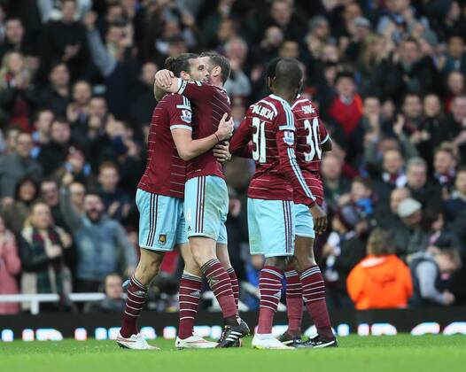 West Ham s Andy Carroll celebrates scoring his sides opening goal Barclays Premier League- West Ham United vs Swansea City - Upton Park - England - 7th December 2014 - Picture David Klein Sportimage EDITORIAL USE ONLY. No use with unauthorised audio, video, data, fixture lists, club league logos or live services. Online in-match use limited to 120 images, no video emulation. No use in betting, games or single club league player publications.