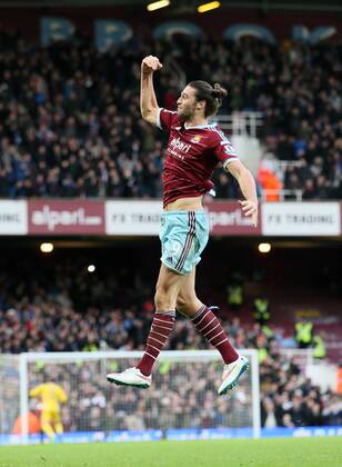 West Ham s Andy Carroll celebrates scoring his sides second goal Barclays Premier League- West Ham United vs Swansea City - Upton Park - England - 7th December 2014 - Picture David Klein Sportimage EDITORIAL USE ONLY. No use with unauthorised audio, video, data, fixture lists, club league logos or live services. Online in-match use limited to 120 images, no video emulation. No use in betting, games or single club league player publications.