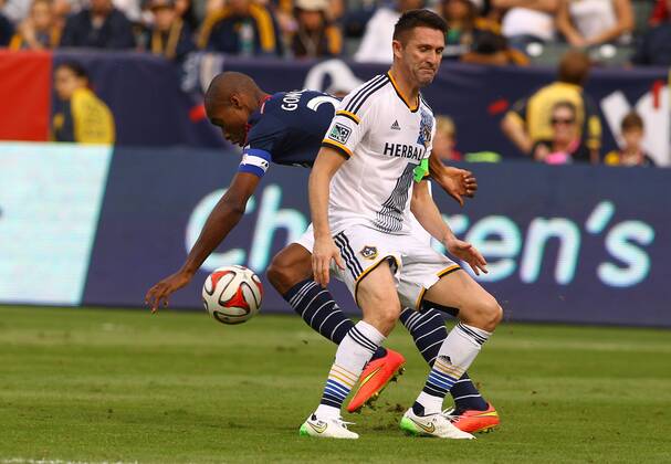 December 07 2014: New England Revolution defender Jose Goncalves (23) gets the ball from Los Angeles Galaxy forward Robbie Keane (7) during the 2014 MLS Fussball Herren USA Cup at StubHub Center, in Carson, CA. Los Angeles Galaxy beat the New England Revolution 2-1 to win their fifth MLS Cup. SOCCER: DEC 07 MLS Cup - Galaxy v Revolution Icon25514120717 EDITORIAL USE ONLY