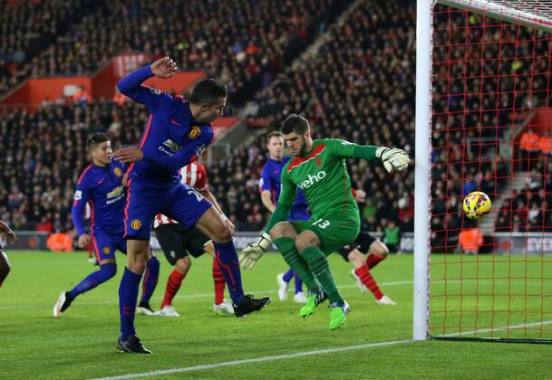 Manchester United ManU s Robin Van Persie scoring his sides second goal Barclays Premier League- Southampton vs Manchester United - St Mary s Stadium - England - 8th December 2014 - Picture David Klein Sportimage EDITORIAL USE ONLY. No use with unauthorised audio, video, data, fixture lists, club league logos or live services. Online in-match use limited to 120 images, no video emulation. No use in betting, games or single club league player publications.