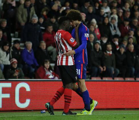 Southampton s Victor Wanyama tussles with Manchester United ManU s Marouane Fellaini Barclays Premier League- Southampton vs Manchester United - St Mary s Stadium - England - 8th December 2014 - Picture DavidKlein Sportimage EDITORIAL USE ONLY. No use with unauthorised audio, video, data, fixture lists, club league logos or live services. Online in-match use limited to 120 images, no video emulation. No use in betting, games or single club league player publications.