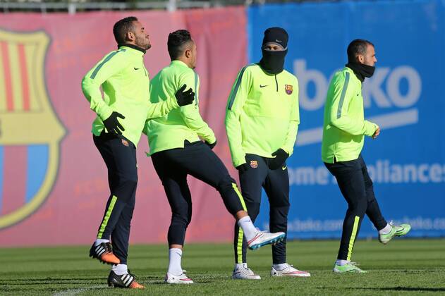 Barcelona, Spain - December -09 BARCELONA SPAIN: Neymar Jr., Douglas and Dani Alves in the training held in the sports city of FCB, on 09 December 2014. Champions League: FC Barcelona Barca Training Session  - ZUMAn230
