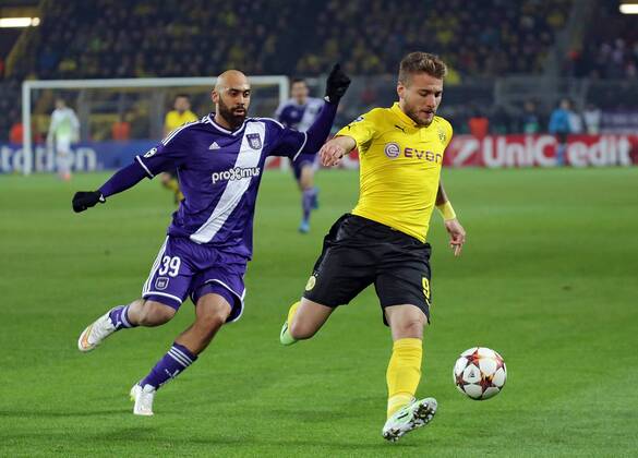 09.12.2014, xovx, Fussball UEFA Champions League, Borussia Dortmund - RSC Anderlecht, v.l. Anthony Vanden Borre (RSC Anderlecht), Ciro Immobile (Borussia Dortmund), Aktion.