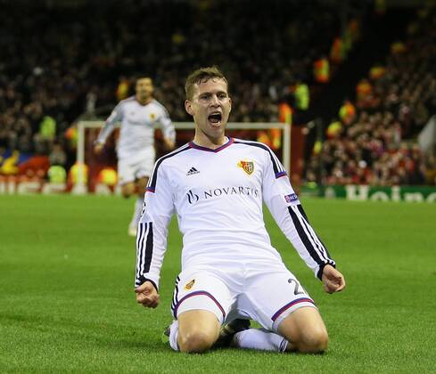 Fabian Frei of Basel celebrates scoring the first goal - UEFA Champions League group B - Liverpool vs Basel - Anfield Stadium - Liverpool - England - 9th December 2014 - Picture Simon Bellis Sportimage EDITORIAL USE ONLY. No use with unauthorised audio, video, data, fixture lists, club league logos or live services. Online in-match use limited to 120 images, no video emulation. No use in betting, games or single club league player publications.