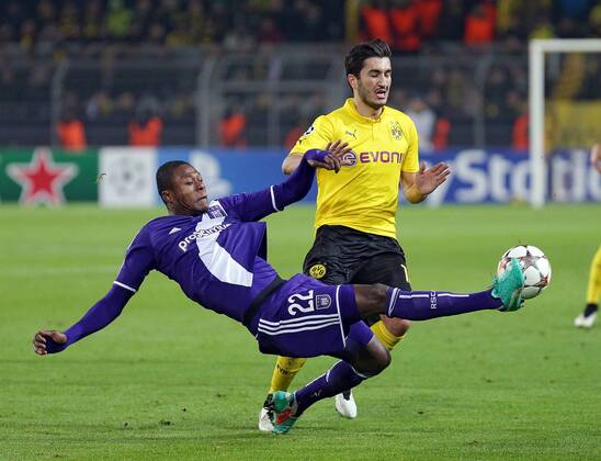 09.12.2014, xovx, Fussball UEFA Champions League, Borussia Dortmund - RSC Anderlecht, v.l. Chancel Mbemba (RSC Anderlecht), Nuri Sahin (Borussia Dortmund), Aktion.