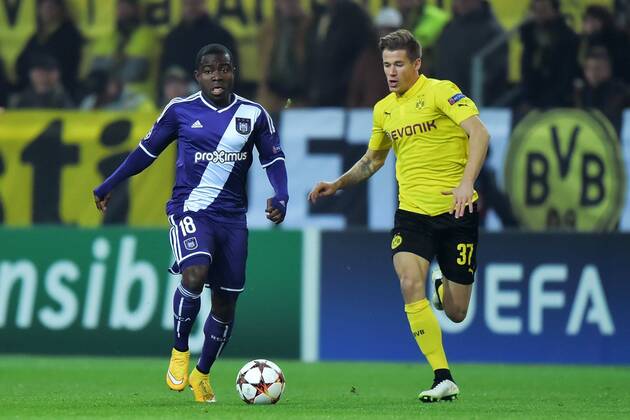 Frank Acheampong of RSC Anderlecht vs Erik Durm of Borussia Dortmund FOOTBALL : Borussia Dortmund vs RSC Anderlecht - UEFA Champions League 2014 2015 - 09 12 2014 PhotoNews Panoramic 