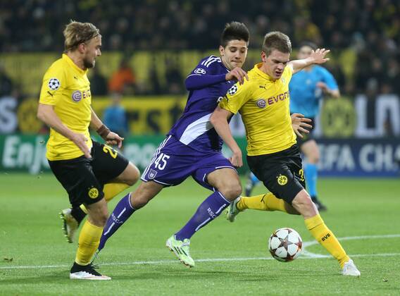 - DORTMUND, GERMANY: Anderlecht s Alexandar Mitrovic and Dortmund s Matthias Ginter fight for the ball during a soccer game between German team Borussia Dortmund and Belgium s RSC Anderlecht, Tuesday 09 December 2014 in Dortmund, Germany, on the sixth and last day of the group stage of the UEFA Champions League competition, in the group D VIRGINIExLEFOUR  x04518388x