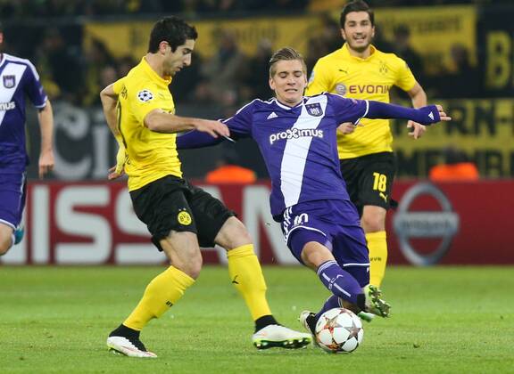 - DORTMUND, GERMANY: Dortmund s Nuri Sahin and Anderlecht s Dennis Praet fight for the ball during a soccer game between German team Borussia Dortmund and Belgium s RSC Anderlecht, Tuesday 09 December 2014 in Dortmund, Germany, on the sixth and last day of the group stage of the UEFA Champions League competition, in the group D VIRGINIExLEFOUR  x04518397x