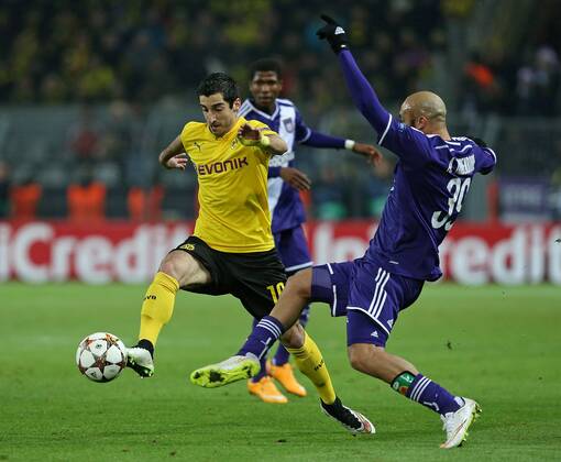 09.12.2014, Fussball Championsleague 2014 2015, Vorrunde, 6.Spieltag, Borussia Dortmund - RSC Anderlecht, im Signal-Iduna-Park-Stadion Dortmund. v.l. Henrikh Mkhitaryan (Dortmund) gegen Anthony Vanden Borre (RSC Anderlecht) 
