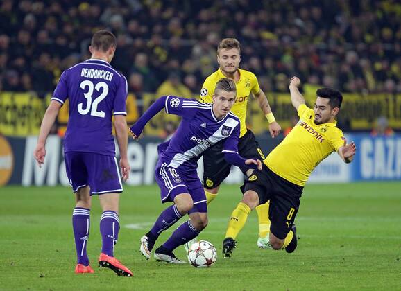 09.12.2014, xovx, Fussball UEFA Champions League, Borussia Dortmund - RSC Anderlecht, v.l. Leander Dendoncker (RSC Anderlecht), Dennis Praet (RSC Anderlecht), Ciro Immobile (Borussia Dortmund), Ilkay Guendogan (Borussia Dortmund), Aktion.