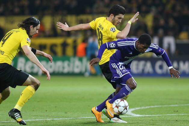 - DORTMUND, GERMANY: Dortmund s Nuri Sahin and Anderlecht s Ibrahima Conte fight for the ball during a soccer game between German team Borussia Dortmund and Belgium s RSC Anderlecht, Tuesday 09 December 2014 in Dortmund, Germany, on the sixth and last day of the group stage of the UEFA Champions League competition, in the group D VIRGINIExLEFOUR  x04518412x