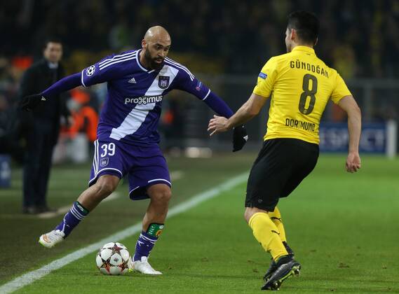 - DORTMUND, GERMANY: Anderlecht s Anthony Vanden Borre and Dortmund s Ilkay Gundogan fight for the ball during a soccer game between German team Borussia Dortmund and Belgium s RSC Anderlecht, Tuesday 09 December 2014 in Dortmund, Germany, on the sixth and last day of the group stage of the UEFA Champions League competition, in the group D VIRGINIExLEFOUR  x04518416x