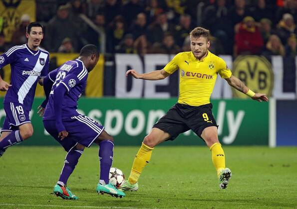 09.12.2014, xovx, Fussball UEFA Champions League, Borussia Dortmund - RSC Anderlecht, v.l. Sascha Kljestan (RSC Anderlecht), Chancel Mbemba (RSC Anderlecht), Ciro Immobile (Borussia Dortmund), Aktion.