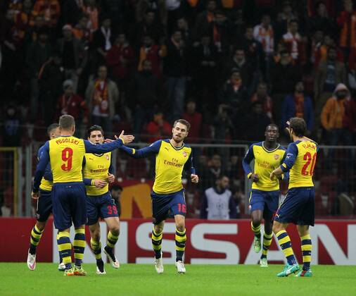 UEFA Champions League Group D match between Galatasaray and Arsenal at Turk Telekom Arena Stadium on December 09, 2014 in Istanbul, Turkey Pictured: Arsenal players celebrates after goal. ( Aaron Ramsey ) 