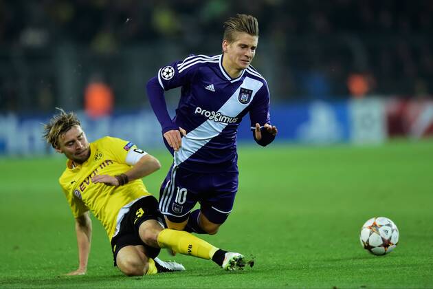 Dennis Praet of RSC Anderlecht vs Marcel Schmelzer of Borussia Dortmund FOOTBALL : Borussia Dortmund vs RSC Anderlecht - UEFA Champions League 2014 2015 - 09 12 2014 PhotoNews Panoramic 