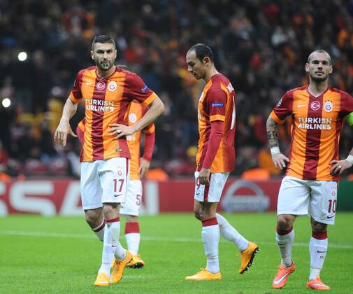 UEFA Champions League Group D match between Galatasaray and Arsenal at Turk Telekom Arena Stadium on December 09, 2014 in Istanbul, Turkey Pictured: Burak Yilmaz , Umut Bulut and Wesley Sneijder of Galatasaray. 