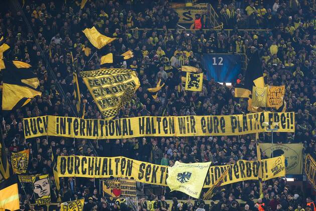 - DORTMUND, GERMANY: Dortmund s supporters pictured during a soccer game between German team Borussia Dortmund and Belgium s RSC Anderlecht, Tuesday 09 December 2014 in Dortmund, Germany, on the sixth and last day of the group stage of the UEFA Champions League competition, in the group D VIRGINIExLEFOUR  x04518486x