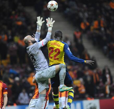 UEFA Champions League Group D match between Galatasaray and Arsenal at Turk Telekom Arena Stadium on December 09, 2014 in Istanbul, Turkey Pictured: Goalkeeper Sinan Bolat of Galatasaray and Yaya Sonogo of Arsenal. 
