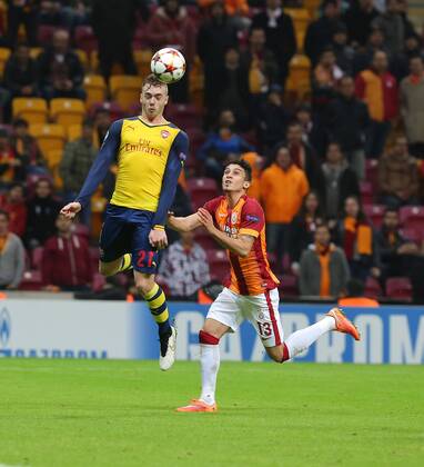 UEFA Champions League Group D match between Galatasaray and Arsenal at Turk Telekom Arena Stadium on December 09, 2014 in Istanbul, Turkey Pictured: Alex Telles (R) of Galatasaray and Calum Chambers (L) of Arsenal. 