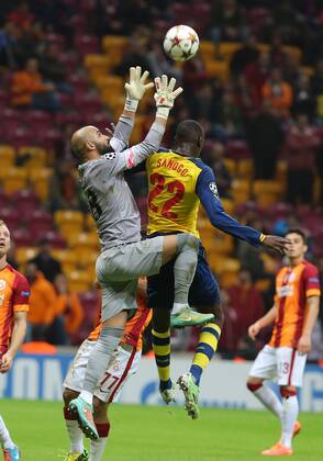 UEFA Champions League Group D match between Galatasaray and Arsenal at Turk Telekom Arena Stadium on December 09, 2014 in Istanbul, Turkey Pictured: Goalkeeper Sinan Bolat of Galatasaray and Yaya Sonogo of Arsenal. 