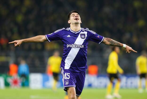 - DORTMUND, GERMANY: Anderlecht s Alexandar Mitrovic celebrates after scoring during a soccer game between German team Borussia Dortmund and Belgium s RSC Anderlecht, Tuesday 09 December 2014 in Dortmund, Germany, on the sixth and last day of the group stage of the UEFA Champions League competition, in the group D VIRGINIExLEFOUR  x04518488x
