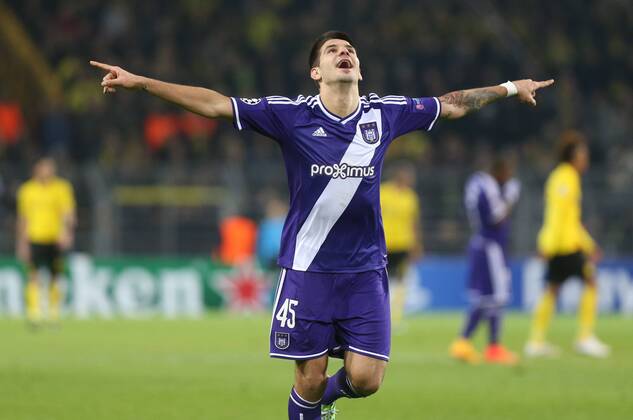 - DORTMUND, GERMANY: Anderlecht s Alexandar Mitrovic celebrates after scoring during a soccer game between German team Borussia Dortmund and Belgium s RSC Anderlecht, Tuesday 09 December 2014 in Dortmund, Germany, on the sixth and last day of the group stage of the UEFA Champions League competition, in the group D VIRGINIExLEFOUR  x04518504x