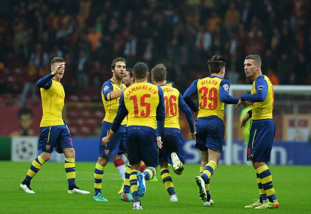 Aktuell Fußball, Champions League, Galatasaray Istanbul - FC Arsenal ISTANBUL, Dec. 9, 2014 -- Arsenal s Lucas Podolski (R) celebrates with his teammates after scoring during the UEFA Champions League group D football match against Galatasaray at Ali Sami Yen Stadium in Istanbul, Turkey, on Dec. 9, 2014. Arsenal won 4-1. ) (SP)TURKEY-ISTANBUL-UEFA-GALATASARAY VS ARSENAL LuxZhe 