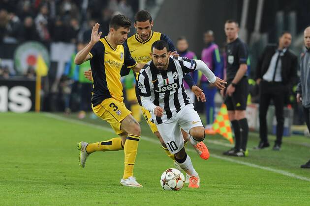 Juventus Turin - Atletico Madrid CARLOS TEVEZ SFUGGE A Guilherme Magdalena Siqueira xHOCHxZWEIx xItalyxPhotoxPressx 