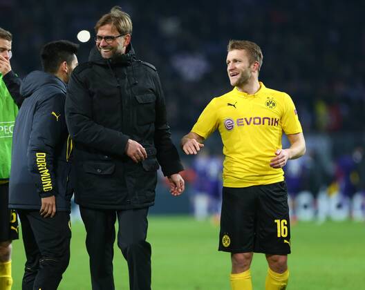 Dienstag 09.12.2014, Saison 2014 2015, UEFA Champions League, 6. Spieltag im Dortmunder Signal Iduna Park, BVB Borussia Dortmund - RSC Anderlecht, Dortmunder Jubel zum Gewinn der Gruppenphase nach Schlusspfiff vor der Südtribüne: Jürgen Klopp (Trainer, BVB) mit Kuba, Jakub Blaszczykowski (BVB), v.l.