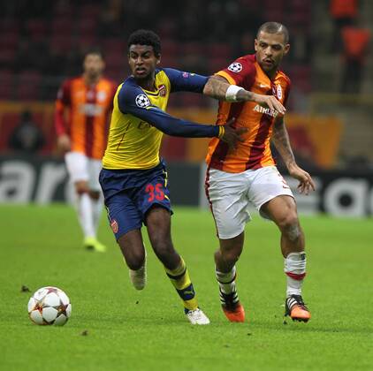 Aktuell Fußball, Champions League, Galatasaray Istanbul - FC Arsenal UEFA Champions League Group D match between Galatasaray and Arsenal at Turk Telekom Arena Stadium on December 09, 2014 in Istanbul, Turkey . Score: Galatasaray 1 - Arsenal 4 Pictured: Felipe Melo (R) of Galatasaray and Gedion Zelalem (L) of Arsenal. 