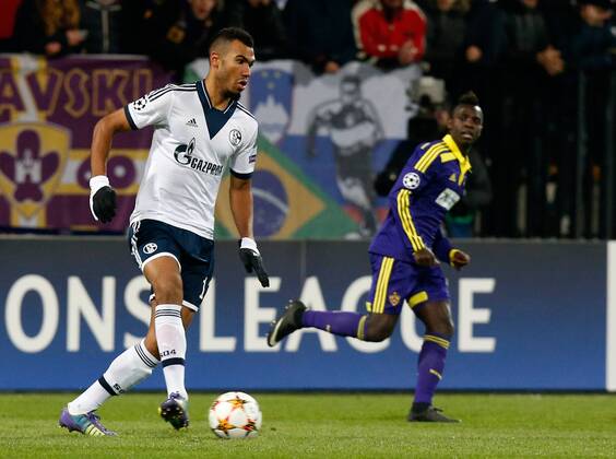 SOCCER - CL, Maribor vs Schalke MARIBOR,SLOVENIA,10.DEC.14 - SOCCER - UEFA Champions League, group stage, NK Maribor vs FC Schalke 04. Image shows Eric Maxim Choupo-Moting (Schalke) and Sintayehu Sallalich (Maribor).