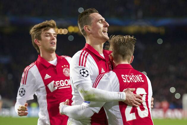 (L-R) Lucas Andersen of Ajax, Arkadiusz Milik of Ajax, Lasse Schone of Ajax during the UEFA Champions League group F match between Ajax Amsterdam and Apoel Nicosia on December 10, 2014 at the Amsterdam Arena in Amsterdam, The Netherlands. Auax Amsterdam v Apoel Nicosia UEFA Champions League Group F 2014 2015 xVIxxIVx 3345144