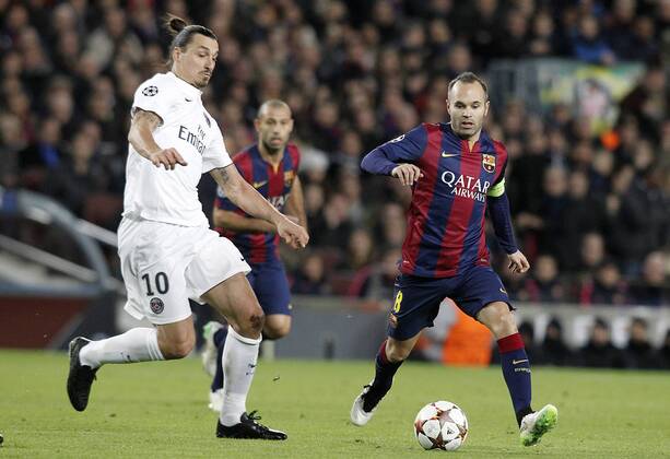 FC Barcelona Barca s Andres Iniesta (r) and Paris Saint-Germain s Zlatan Ibrahimovic during Champions League 2014 2015 match.December 10,2014.  (2014121023)