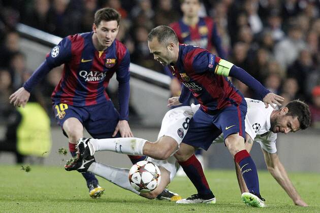 FC Barcelona Barca s Leo Messi (l) and Andres Iniesta (r) and Paris Saint-Germain s Thiago Motta during Champions League 2014 2015 match.December 10,2014.  (2014121028)