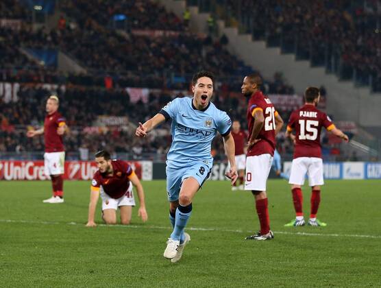 Manchester City s Samir Nasri celebrates scoring his sides opening goal UEFA Champions League- Roma vs Manchester City - Stadio Olimpico - Italy - 10th December 2014 - Picture David Klein Sportimage EDITORIAL USE ONLY. No use with unauthorised audio, video, data, fixture lists, club league logos or live services. Online in-match use limited to 120 images, no video emulation. No use in betting, games or single club league player publications.