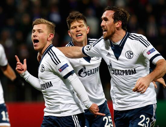 SOCCER - CL, Maribor vs Schalke MARIBOR,SLOVENIA,10.DEC.14 - SOCCER - UEFA Champions League, group stage, NK Maribor vs FC Schalke 04. Image shows the rejoicing of Max Meyer, Klaas-Jan Huntelaar and Christian Fuchs (Schalke).