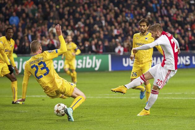 (L-R) Vinicius of Apoel FC, Tasos Papazoglou of Apoel FC, Nuno Morais of Apoel FC Pieros Sotiriou of Apoel FC 2-0 during the UEFA Champions League group F match between Ajax Amsterdam and Apoel Nicosia on December 10, 2014 at the Amsterdam Arena in Amsterdam, The Netherlands. Auax Amsterdam v Apoel Nicosia UEFA Champions League Group F 2014 2015 xVIxxIVx 3345260