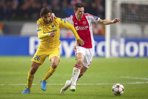 (L-R) Nuno Morais of Apoel FC, Nick Viergever of Ajax during the UEFA Champions League group F match between Ajax Amsterdam and Apoel Nicosia on December 10, 2014 at the Amsterdam Arena in Amsterdam, The Netherlands. Auax Amsterdam v Apoel Nicosia UEFA Champions League Group F 2014 2015 xVIxxIVx 3345455