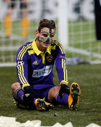 SOCCER - CL, Maribor vs Schalke MARIBOR,SLOVENIA,10.DEC.14 - SOCCER - UEFA Champions League, group stage, NK Maribor vs FC Schalke 04. Image shows Petar Stojanovic (Maribor). Keyword: injury.