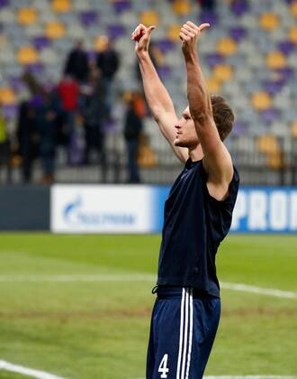 SOCCER - CL, Maribor vs Schalke MARIBOR,SLOVENIA,10.DEC.14 - SOCCER - UEFA Champions League, group stage, NK Maribor vs FC Schalke 04. Image shows Benedikt Hoewedes (Schalke).