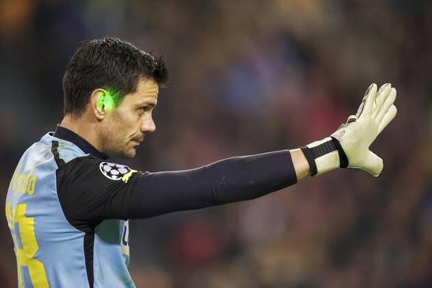 goalkeeper Urko Pardo of Apoel FC laserpen during the UEFA Champions League group F match between Ajax Amsterdam and Apoel Nicosia on December 10, 2014 at the Amsterdam Arena in Amsterdam, The Netherlands. Auax Amsterdam v Apoel Nicosia UEFA Champions League Group F 2014 2015 xVIxxIVx 3345483