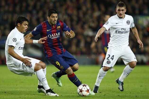 (141211) -- BARCELONA, Barcelona s Luis Suarez (C) vies for the ball during the UEFA Champions League group F football match against Paris Saint-Germain in Barcelona, Spain, on Dec. 10, 2014. Barcelona won 3-1. ) (SP)SPAIN-BARCELONA-SOCCER-UEFA PauxBarrena 