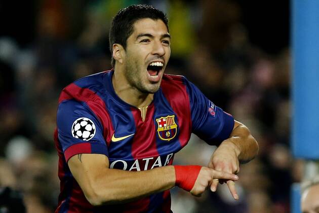 (141211) -- BARCELONA, Barcelona s Luis Suarez celebrates scoring during the UEFA Champions League group F football match against Paris Saint-Germain in Barcelona, Spain, on Dec. 10, 2014. Barcelona won 3-1. ) (SP)SPAIN-BARCELONA-SOCCER-UEFA PauxBarrena 